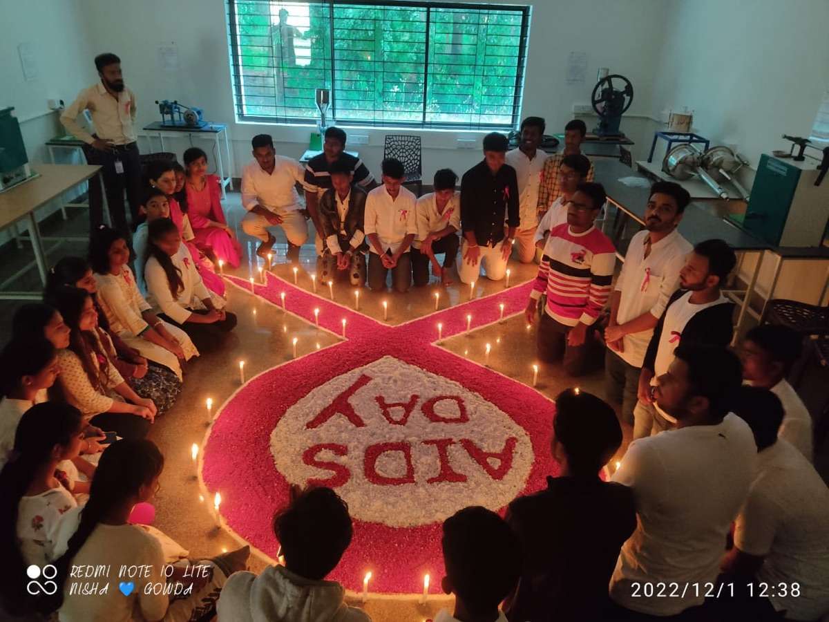 VSCP pharmacy students at World AIDS Day awareness event with candle lighting ceremony