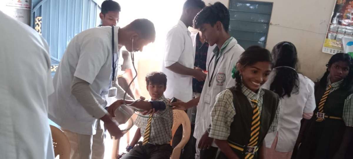 VSCP pharmacy students conducting free health checkup camp for school children